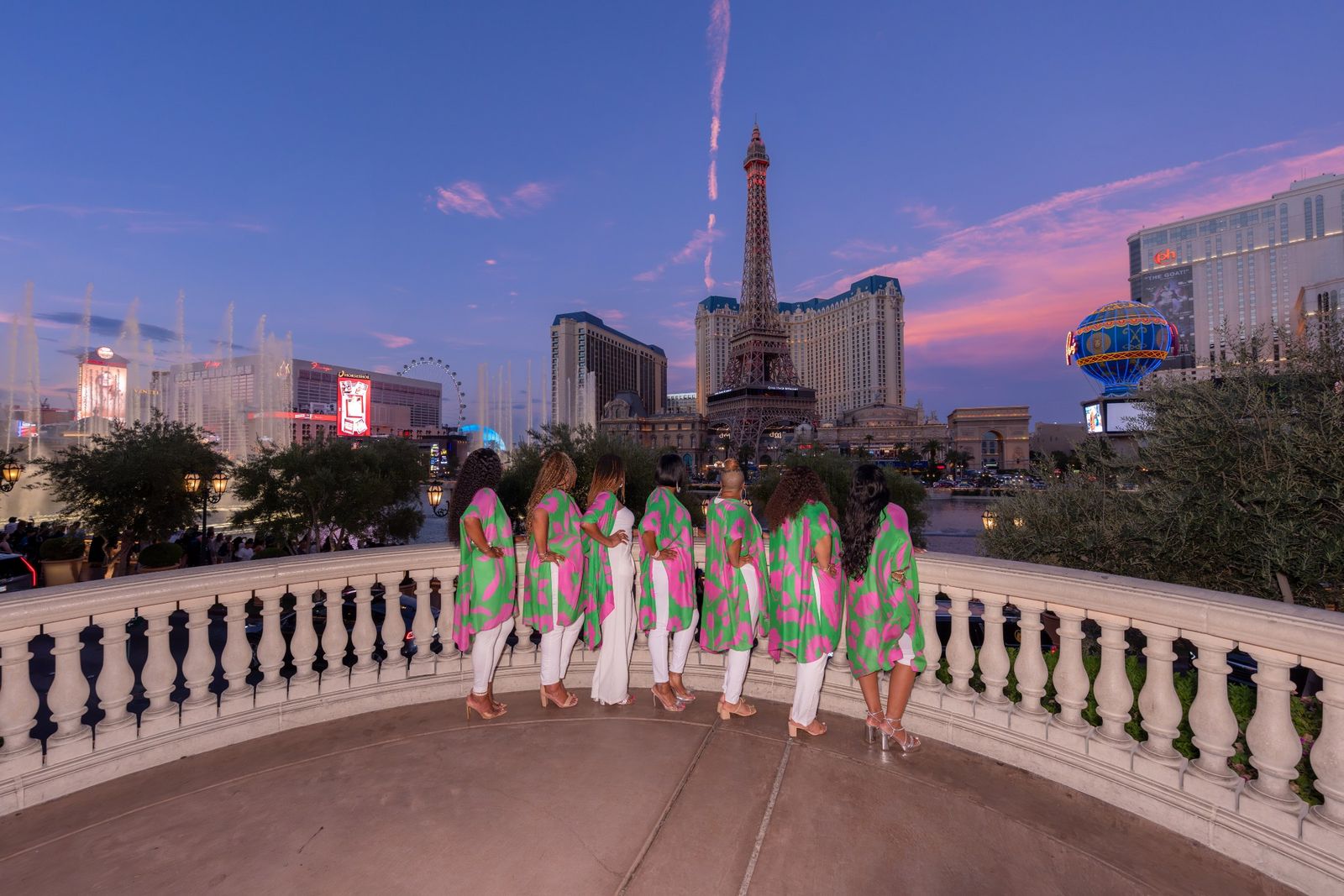 Sisters lined along the balustrade with the skyline behind