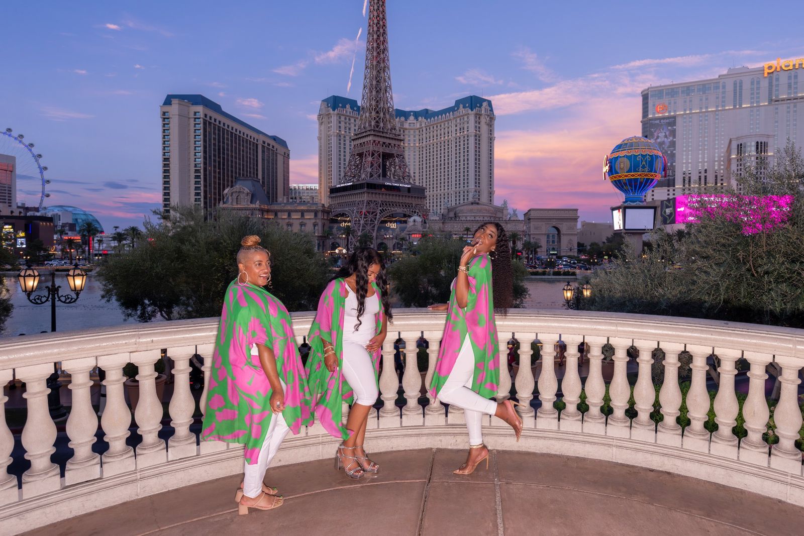 Sisters walking the balcony at sunset on the Las Vegas Strip